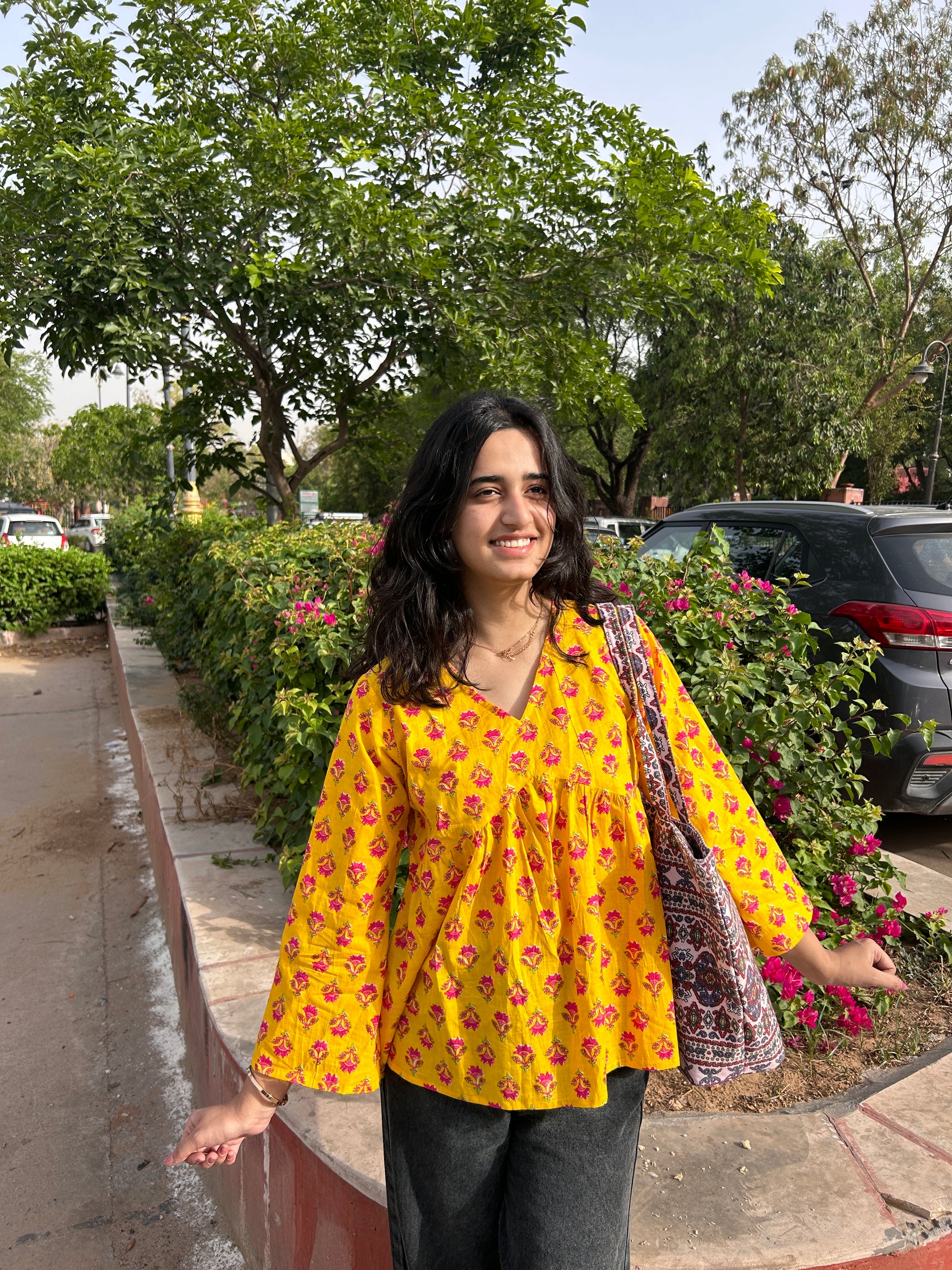 Amber yellow full sleeve kurti with pink and red floral block prin