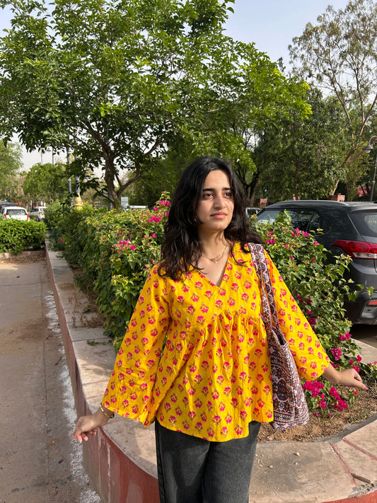 Amber yellow full sleeve kurti with pink and red floral block prin