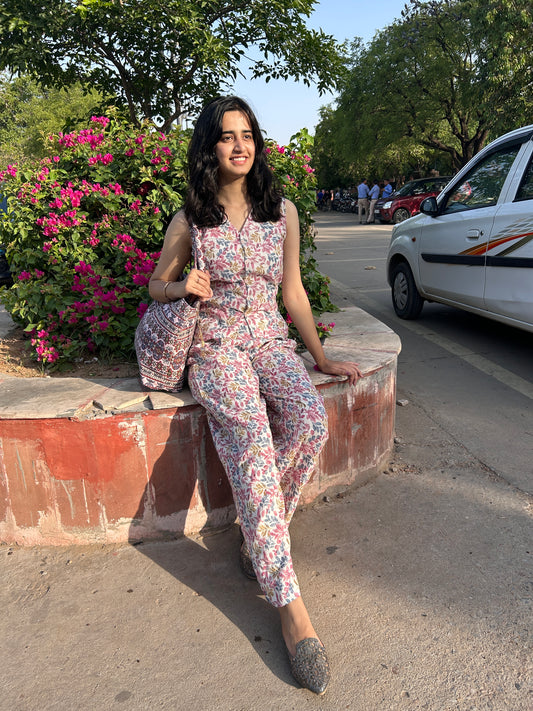 Woman wearing cotton floral co-ord set with sleeveless top and wide-leg pants – Botanical Bloom summer outfit