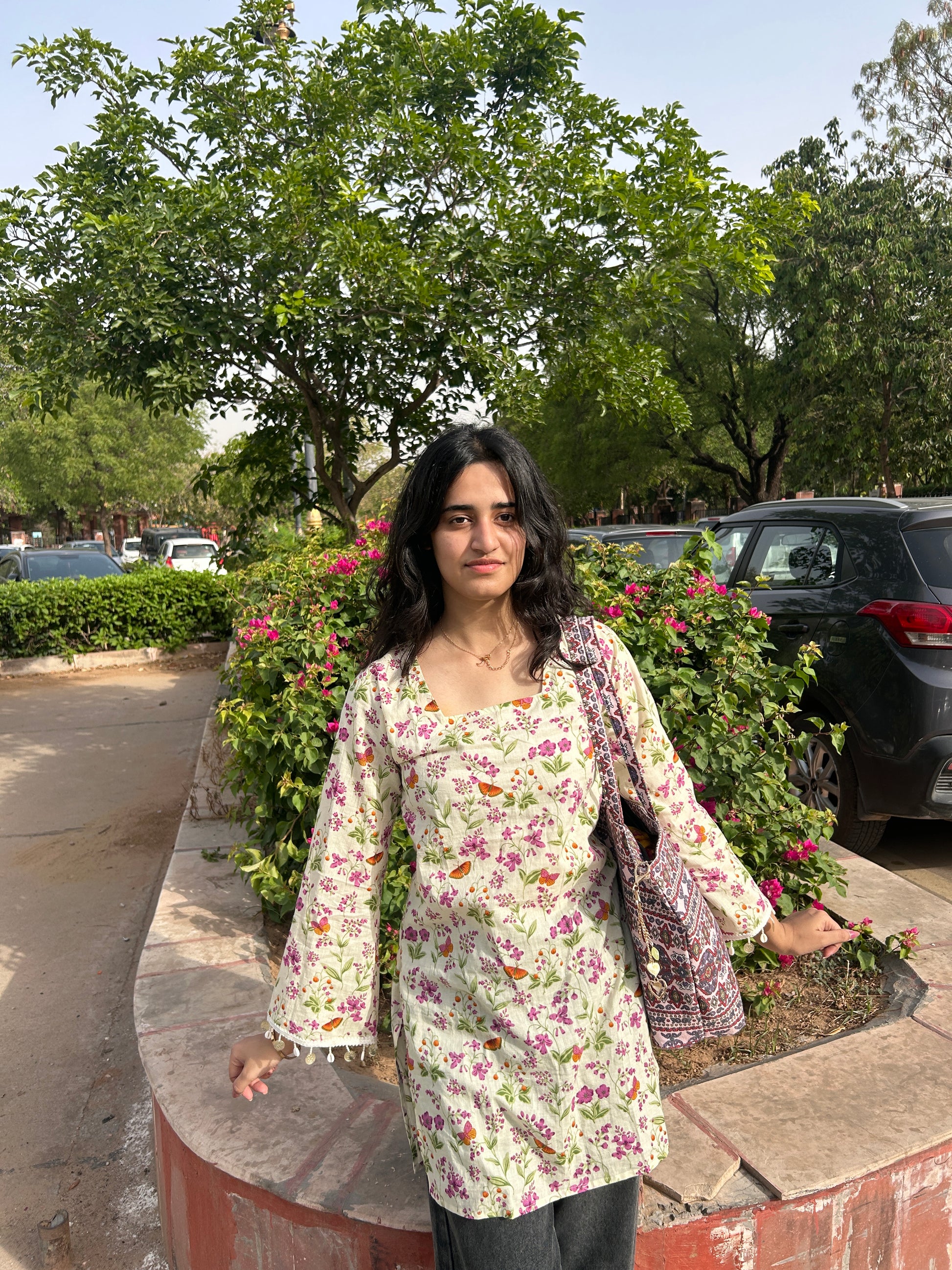 GULNAARI kurti with multicolor floral detailing and lace-trimmed sleeves