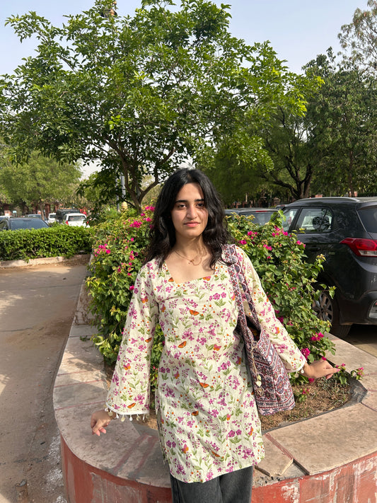 GULNAARI kurti with multicolor floral detailing and lace-trimmed sleeves